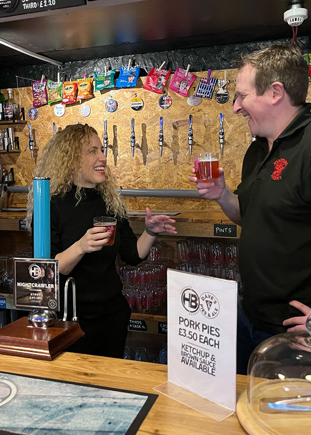 Katie tasting beer with brewery owner